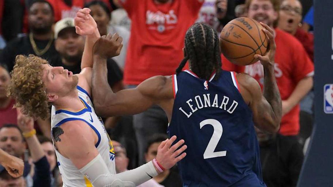  Apr 15, 2026; Inglewood, California, USA; Golden State Warriors guard Brandin Podziemski (2) is fouled by Los Angeles Clippers forward Kawhi Leonard (2) in the second half during the play-in rounds of the 2026 NBA Playoffs at Intuit Dome. Mandatory Credit: Jayne Kamin-Oncea-Imagn Images | Jayne Kamin-Oncea-Imagn Images 