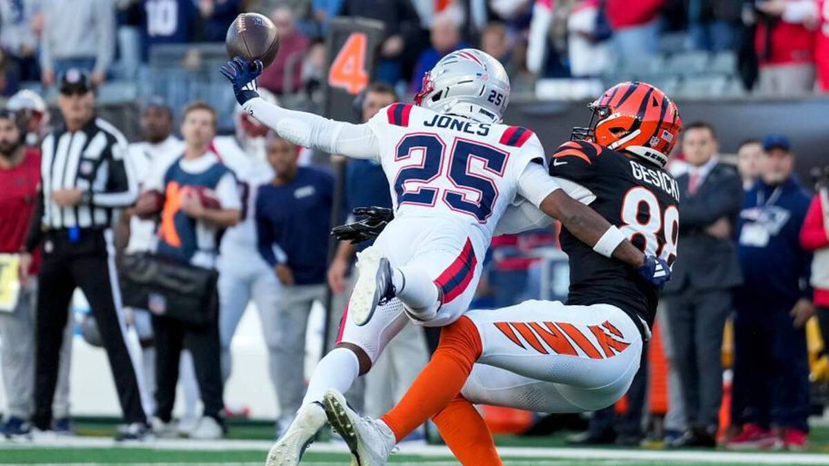  New England Patriots cornerback Marcus Jones (25) breaks up a pass to Cincinnati Bengals tight end Mike Gesicki (88) in the fourth quarter of the NFL Week 12 game between the Cincinnati Bengals and the New England Patriots at Paycor Stadium in downtown Cincinnati on Sunday, Nov. 23, 2025. The Bengals fall to 3-8 with a 26-20 loss at home. | USA TODAY Network via Reuters Connect 