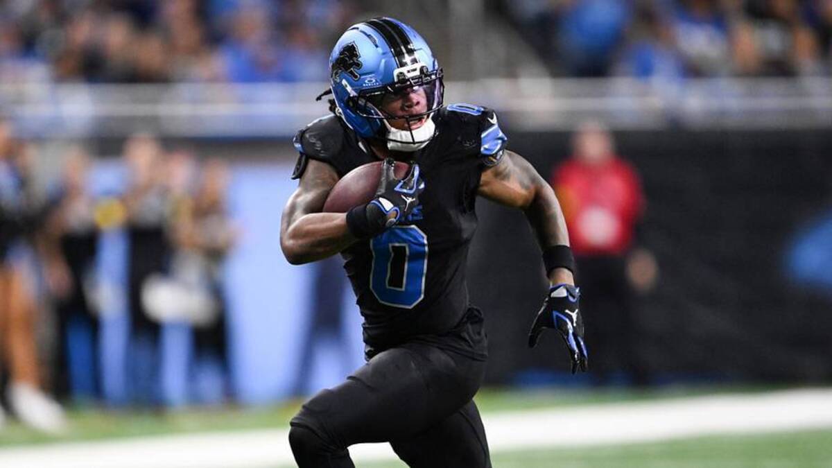  Detroit Lions running back Jahmyr Gibbs (0) runs with the ball for a touchdown during the fourth quarter against the New York Giants at Ford Field. | Lon Horwedel-Imagn Images 