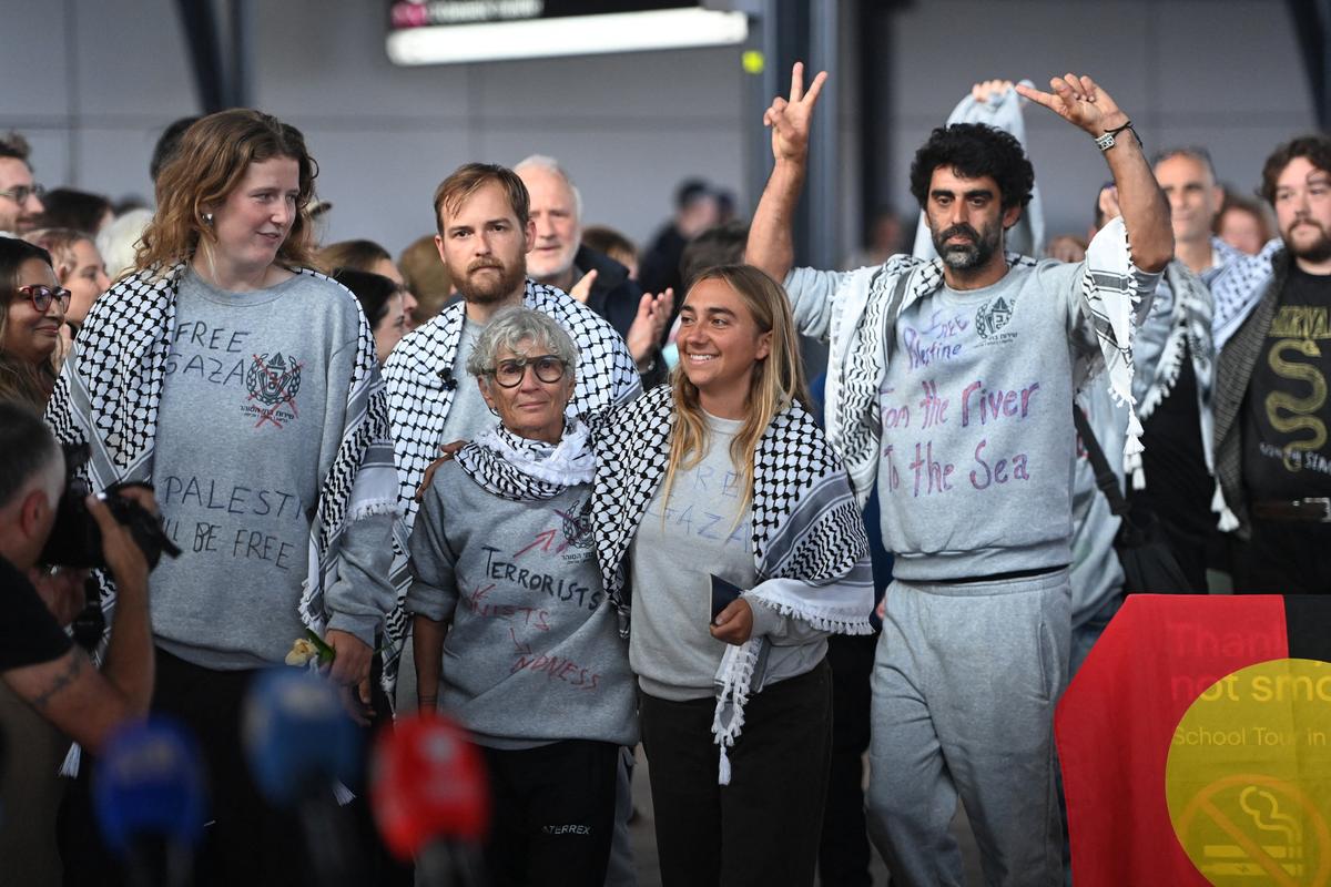 Australian members of the Gaza-bound Global Sumud Flotilla, which was intercepted by Israeli forces, arrive at Sydney International Airport, Sydney, Australia, May 25, 2026. REUTERS/Jeremy Piper     TPX IMAGES OF THE DAY