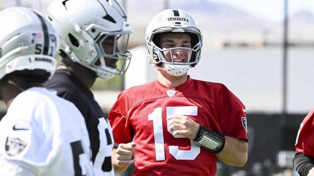  Jun 3, 2026; Henderson, NV, USA; Las Vegas Raiders quarterback Fernando Mendoza (15) warms up during organized team activities at Intermountain Health Performance Center. | Candice Ward-Imagn Images 