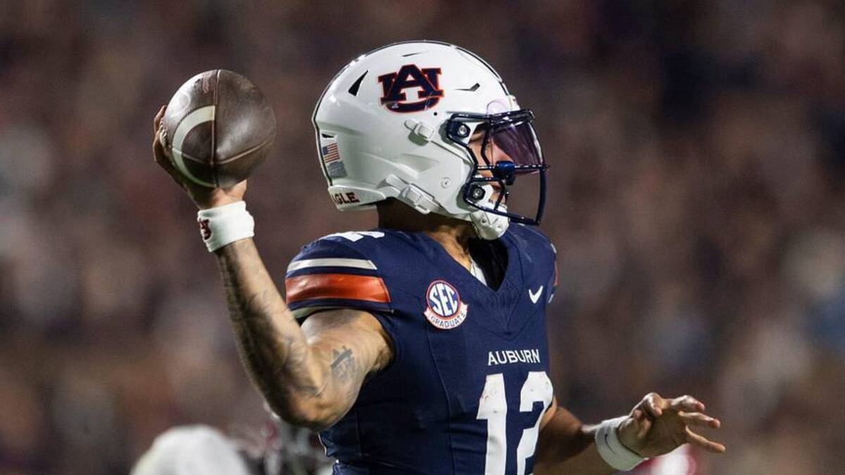  Auburn Tigers quarterback Ashton Daniels (12) throws the ball as Auburn Tigers take on Alabama Crimson Tide in the Iron Bowl at Jordan-Hare Stadium in Auburn, Ala. on Saturday, Nov. 29, 2025. Alabama Crimson Tide defeated Auburn Tigers 27-20. | Jake Crandall/ Advertiser / USA TODAY NETWORK via Imagn Images 