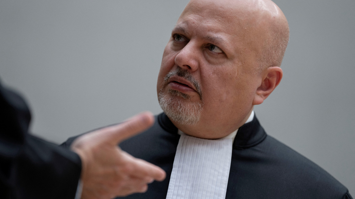 FILE PHOTO: Chief Prosecutor Karim Khan talks while waiting for former Philippine President Rodrigo Duterte to appear via video link before the International Criminal Court (ICC), in The Hague, Netherlands, Friday, March 14, 2025.     Peter Dejong/Pool via REUTERS/File Photo