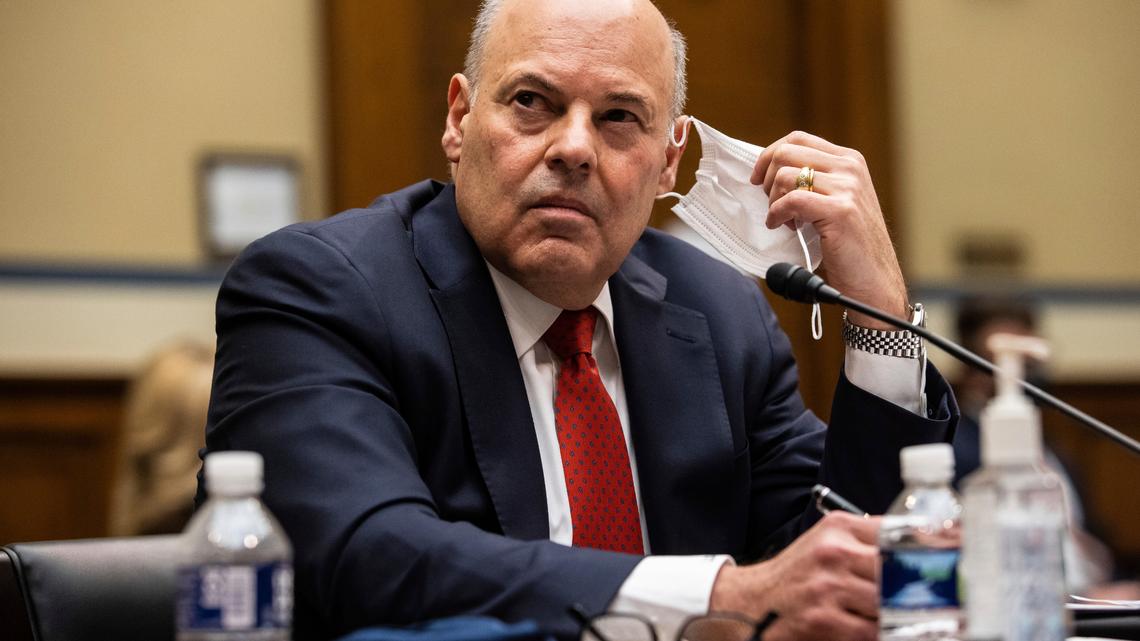 United States Postal Service Postmaster General Louis DeJoy looks on during a House Oversight and Reform Committee hearing on “Legislative Proposals to Put the Postal Service on Sustainable Financial Footing” on Capitol Hill, Wednesday, Feb. 24, 2021, in Washington.