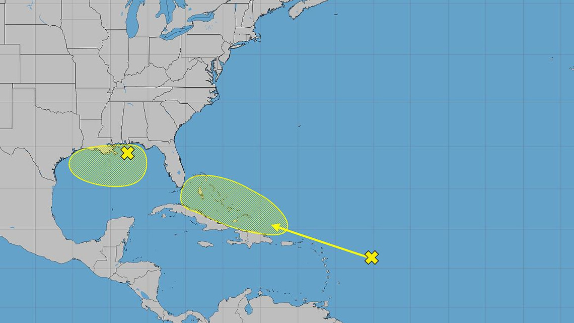 Hurricane center tracking 2 systems, including remnants of Tropical Storm Dolly 