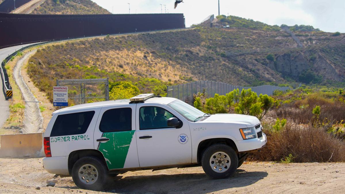 A U.S. Border Patrol vehicle drives along the U.S.-Mexico border road in the Tijuana River Valley on July 15, 2024 in San Diego, California. (Alejandro Tamayo/The San Diego Union-Tribune/TNS)