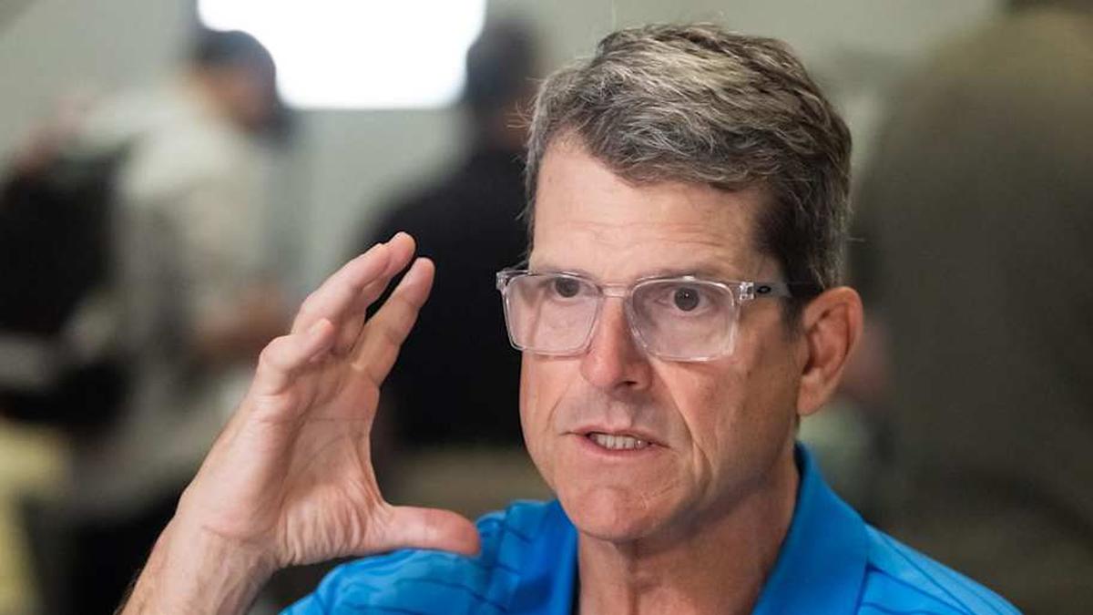  Mar 31, 2026; Phoenix, AZ, USA; Los Angeles Chargers head coach Jim Harbaugh speaks to reporters in the media during the 2026 NFL Annual League Meeting at the Arizona Biltmore. Mandatory Credit: Mark J. Rebilas-Imagn Images | Mark J. Rebilas-Imagn Images 
