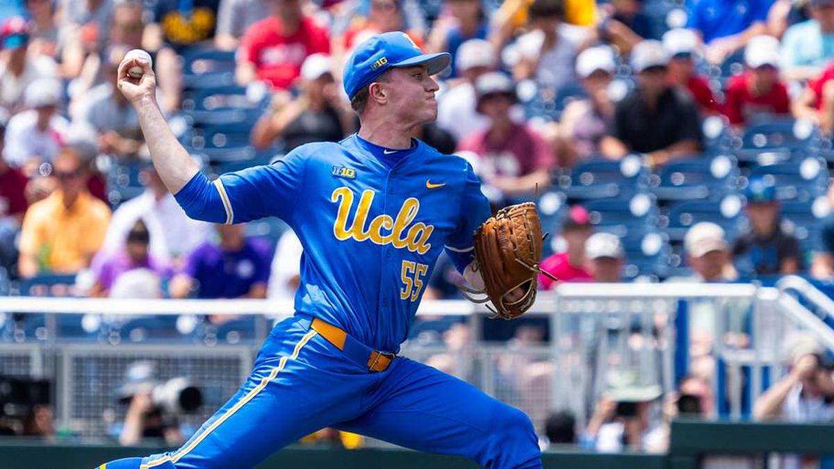 Jun 14, 2025; Omaha, Neb, USA; UCLA Bruins starting pitcher Michael Barnett (55) pitches against the Murray State Racers during the first inning at Charles Schwab Field. Mandatory Credit: Dylan Widger-Imagn Images | Dylan Widger-Imagn Images 