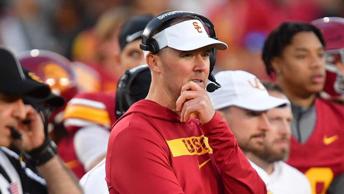  Nov 16, 2024; Los Angeles, California, USA; Southern California Trojans head coach Lincoln Riley watches game action against the Nebraska Cornhuskers during the second half at the Los Angeles Memorial Coliseum. Mandatory Credit: Gary A. Vasquez-Imagn Images | Gary A. Vasquez-Imagn Images 