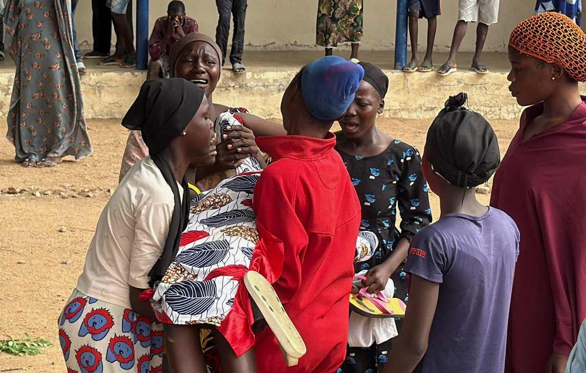 Parents react as they welcome their rescued children a day after gunmen stormed Government Day Secondary School and abducted students during exams, in Lassa, Borno State, Nigeria, June 30, 2026. Picture taken with a mobile phone. REUTERS/Umaru Kirawa