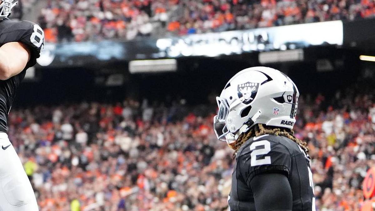  Dec 7, 2025; Paradise, Nevada, USA; Las Vegas Raiders tight end Brock Bowers (89) reacts with wide receiver Jack Bech (18) after scoring a touchdown against the Denver Broncos during the first half at Allegiant Stadium. Mandatory Credit: Stephen R. Sylvanie-Imagn Images | Stephen R. Sylvanie-Imagn Images 