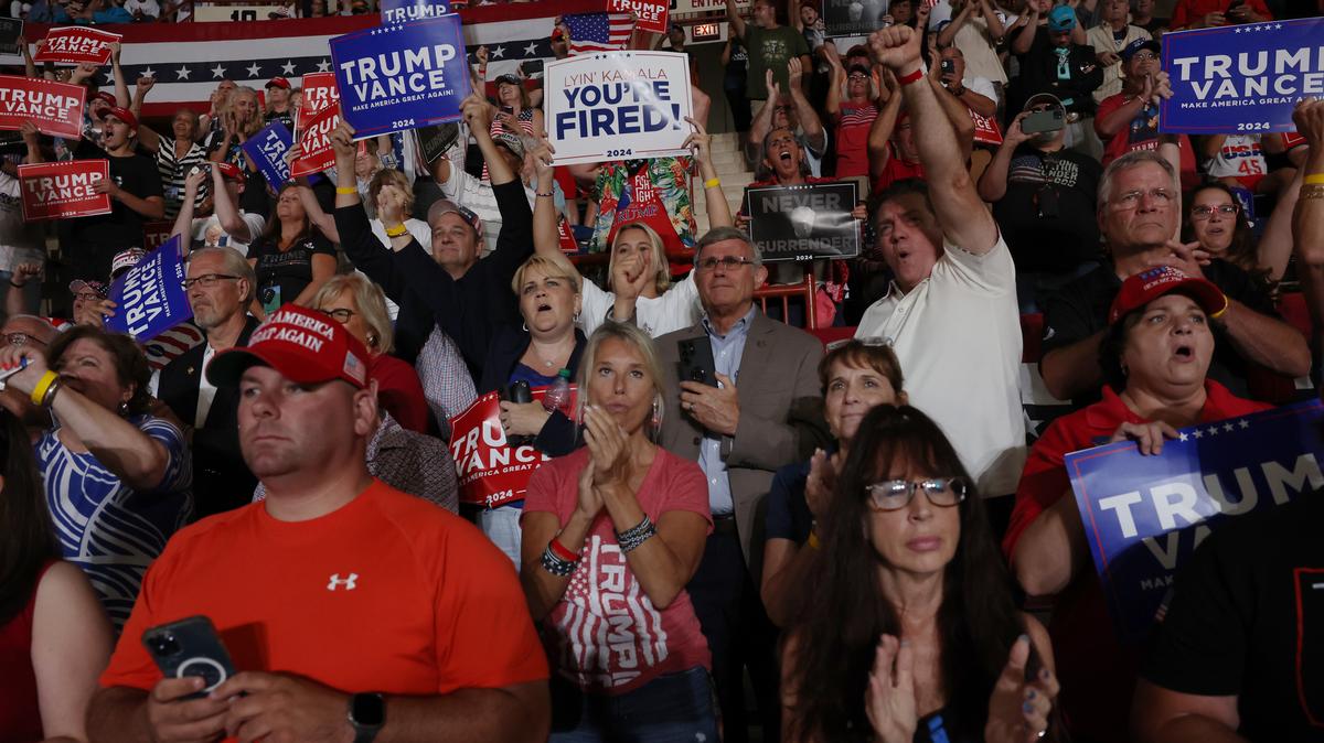 Trump Holds Campaign Rally In Harrisburg, Pennsylvania. HARRISBURG, PENNSYLVANIA - JULY 31:  Supporters watch Republican presidential nominee, former U.S. President Donald Trump speak at a rally on July 31, 2024 in Harrisburg, Pennsylvania. Trump is returning to Pennsylvania for the first time since the assassination attempt. Polls show a close race with Democratic presidential candidate, U.S. Vice President Kamala Harris.  (Photo by Spencer Platt/Getty Images)