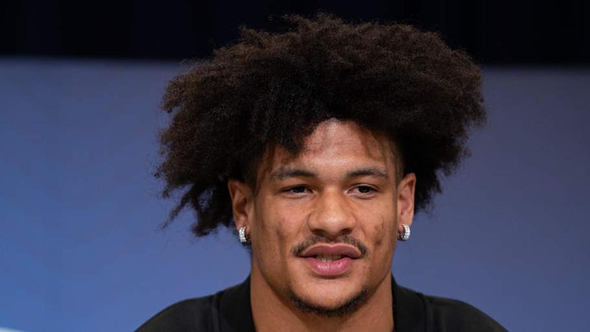  Feb 27, 2026; Indianapolis, IN, USA; Washington wideout Denzel Boston (WO08) speaks to members of the media during the NFL Combine at the Indiana Convention Center. Mandatory Credit: Jacob Musselman-Imagn Images | Jacob Musselman-Imagn Images 