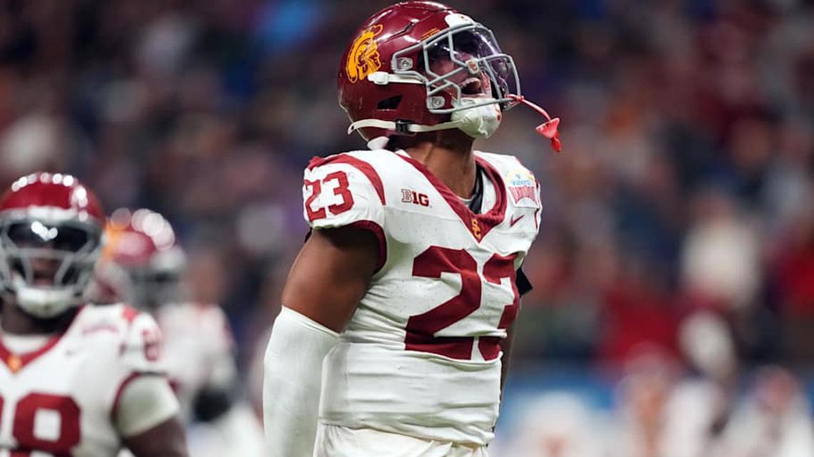 Dec 30, 2025; San Antonio, TX, USA; Southern California Trojans linebacker Desman Stephens II (23) celebrates against the TCU Horned Frogs in the second half during the Alamo Bowl at Alamodome. Mandatory Credit: Kirby Lee-Imagn Images | Kirby Lee-Imagn Images 