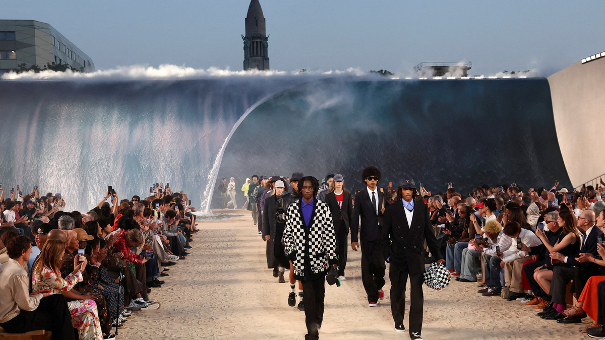 FILE PHOTO: Models present creations by designer and musician Pharrell Williams as part of his Menswear Spring-Summer 2027 collection show for fashion house Louis Vuitton during Men's Fashion Week in Paris, France, June 23, 2026. REUTERS/Gonzalo Fuentes/File Photo