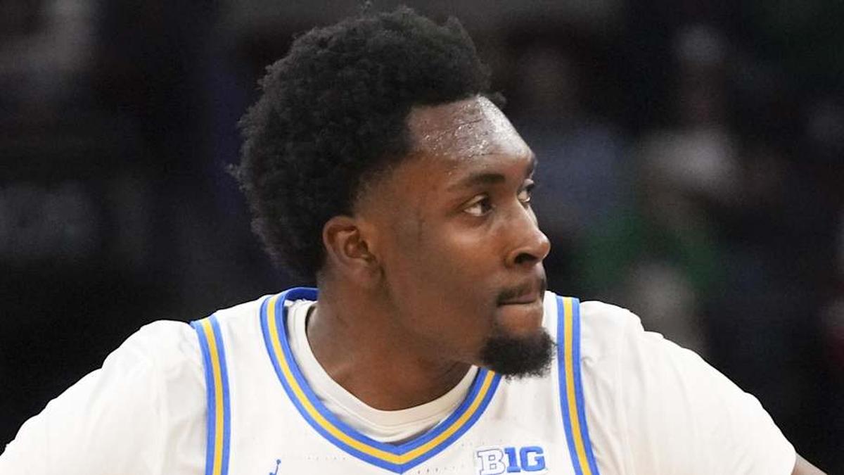  Mar 14, 2026; Chicago, IL, USA; UCLA Bruins center Xavier Booker (1) reacts after making a three point basket against the Purdue Boilermakers during the first half at United Center. Mandatory Credit: David Banks-Imagn Images | David Banks-Imagn Images 