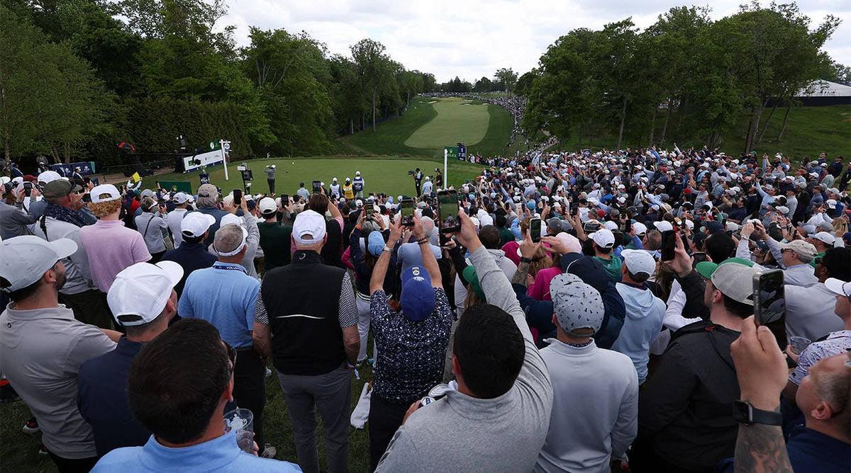  Scottie Scheffler plays his shot from the first tee during the first round of the PGA Championship golf tournament at Aronimink Golf Club. (Credit: Bill Streicher-Imagn Images)