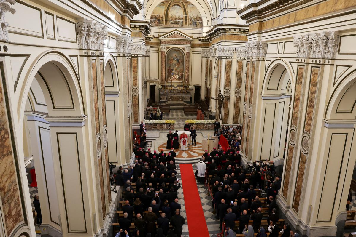 Pope Leo XIV attends a meeting with bishops, members of the clergy, and families whose members have been victims of environmental pollution at the Cathedral of Santa Maria Assunta, in Acerra, Italy, May 23, 2026. REUTERS/Ciro De Luca