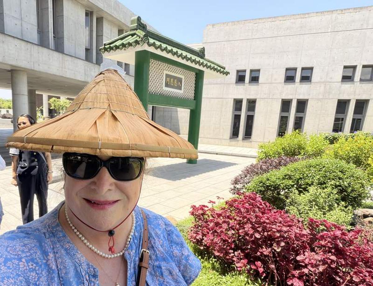  The author embracing Taiwanese culture. Photo credit: Marguerite "Peggy" Cleveland 