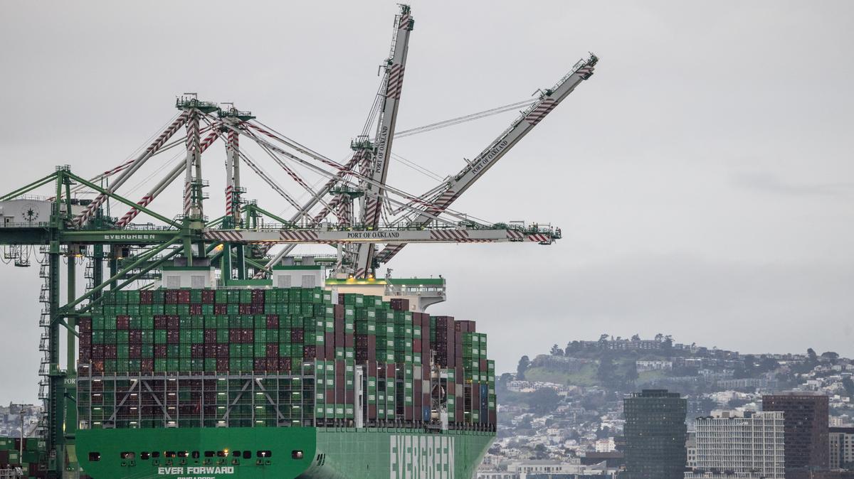Shipping containers are stacked on a cargo ship at the port of Oakland in Oakland, California, U.S., February 24, 2026. REUTERS/Carlos Barria