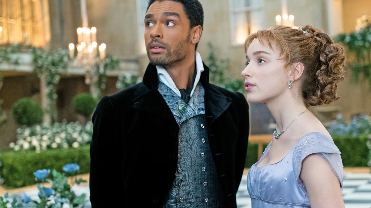 Daphne (Phoebe Dynevor) and Simon (Regé-Jean Page) have a steamy romance in season one of “Bridgerton,” set in England’s Regency period.