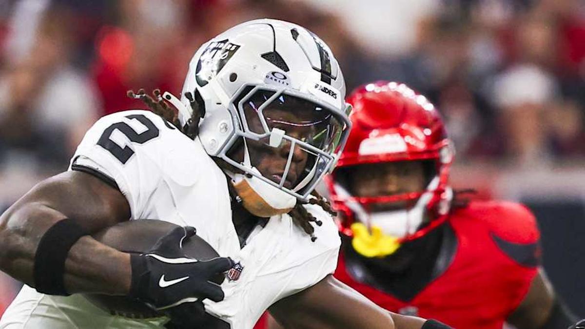  Dec 21, 2025; Houston, Texas, USA; Las Vegas Raiders running back Ashton Jeanty (2) rushes against the Houston Texans during the first quarter at NRG Stadium. Mandatory Credit: Thomas Shea-Imagn Images | Thomas Shea-Imagn Images 