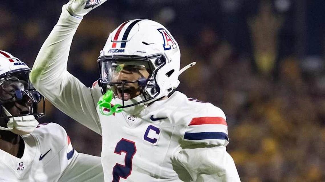  Nov 28, 2025; Tempe, Arizona, USA; Arizona Wildcats defensive back Treydan Stukes (2) celebrates with defensive back Ayden Garnes (9) after an interception against Arizona State Sun Devils in the second half during the 99th Territorial Cup at Mountain America Stadium. Mandatory Credit: Mark J. Rebilas-Imagn Images | Mark J. Rebilas-Imagn Images 