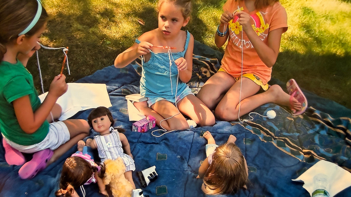 USA TODAY Books reporter Clare Mulroy (far right) at a neighborhood American Girl-themed camp circa 2010.