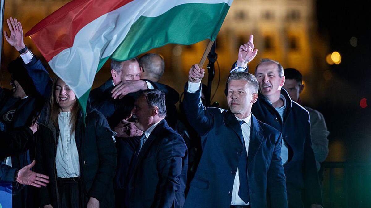 Peter Magyar, lead candidate of the Tisza party, speaks to supporters in Budapest after the party won the Hungarian parliamentary elections on Sunday. Magyar, who has gone into the election with a substantial lead in polls, swept to an overwhelming victory to unseat Prime Minister Viktor Orban.