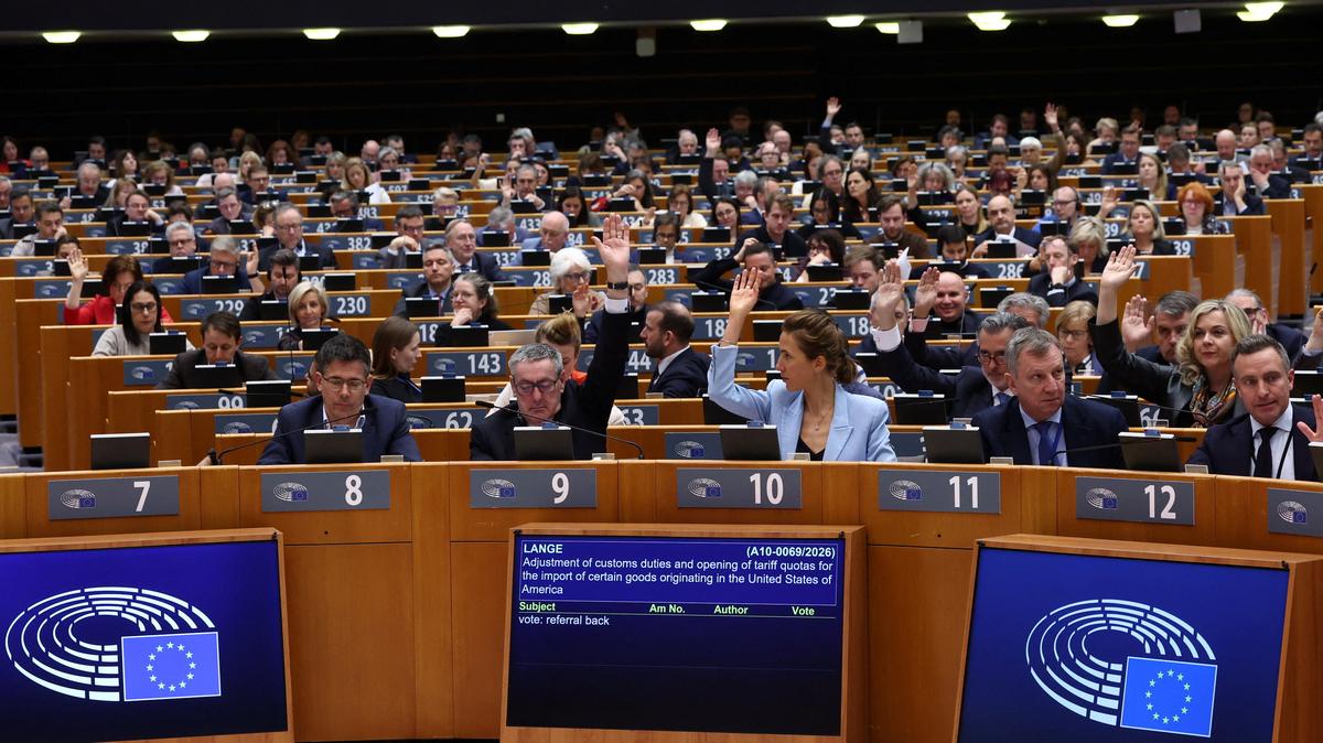 Members of the European Parliament attend a session in Brussels on March 26 to vote on legislation to cut import duties for U.S. products. The European Union struck a provisional agreement on that legislation on Wednesday, a move likely to avert higher U.S. tariffs on EU products.