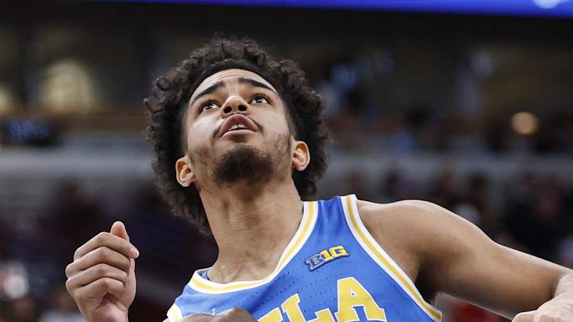  Mar 13, 2026; Chicago, IL, USA; Michigan State Spartans forward Cameron Ward (3) and UCLA Bruins guard Eric Freeny (8) battle for a rebound during the first half at United Center. Mandatory Credit: Kamil Krzaczynski-Imagn Images | Kamil Krzaczynski-Imagn Images 