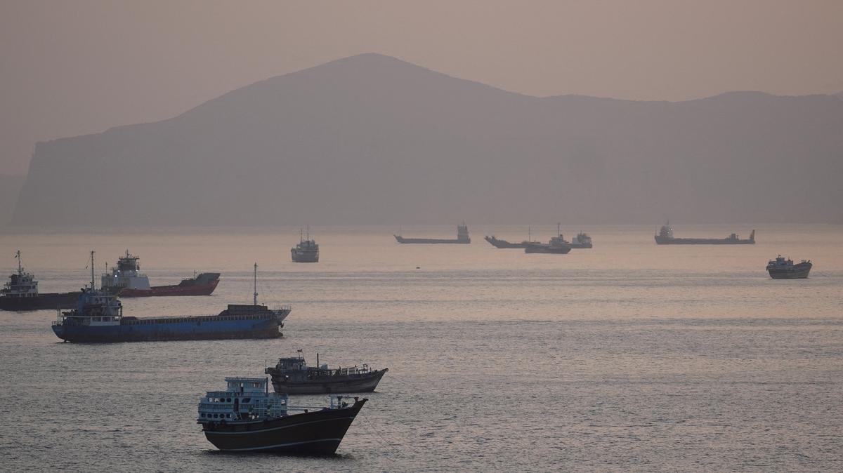Ships and boats in the Strait of Hormuz near Musandam, Oman, on Friday. President Donald Trump said on Sunday that the U.S. would start helping free ships stranded in the Persian Gulf by the U.S.-Israeli war on Iran.