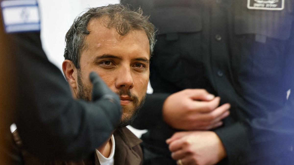 Brazilian Activist Thiago Avila, who was detained aboard the Gaza-bound Global Sumud Flotilla, which was intercepted by Israeli forces in international waters, appears at a court in Beersheba, southern Israel May 6, 2026. REUTERS/Amir Cohen