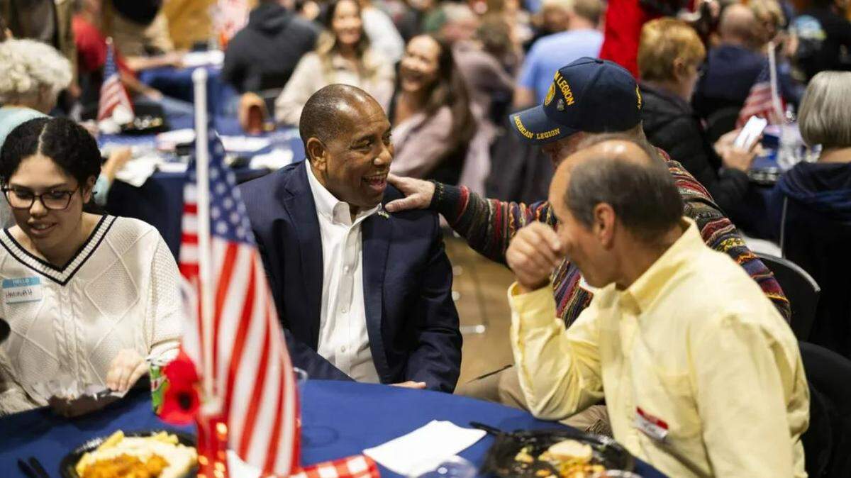 Semi Bird, center, talks to supporters at a fundraising event at The Lodge at Frontier Park in Graham, Pierce County, on Nov. 10.