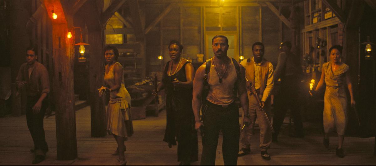 Jayme Lawson, Wunmi Mosaku, Michael B. Jordan, Miles Caton and Li Jun Li prepare for battle in “Sinners.” (Warner Bros. Pictures/TNS)