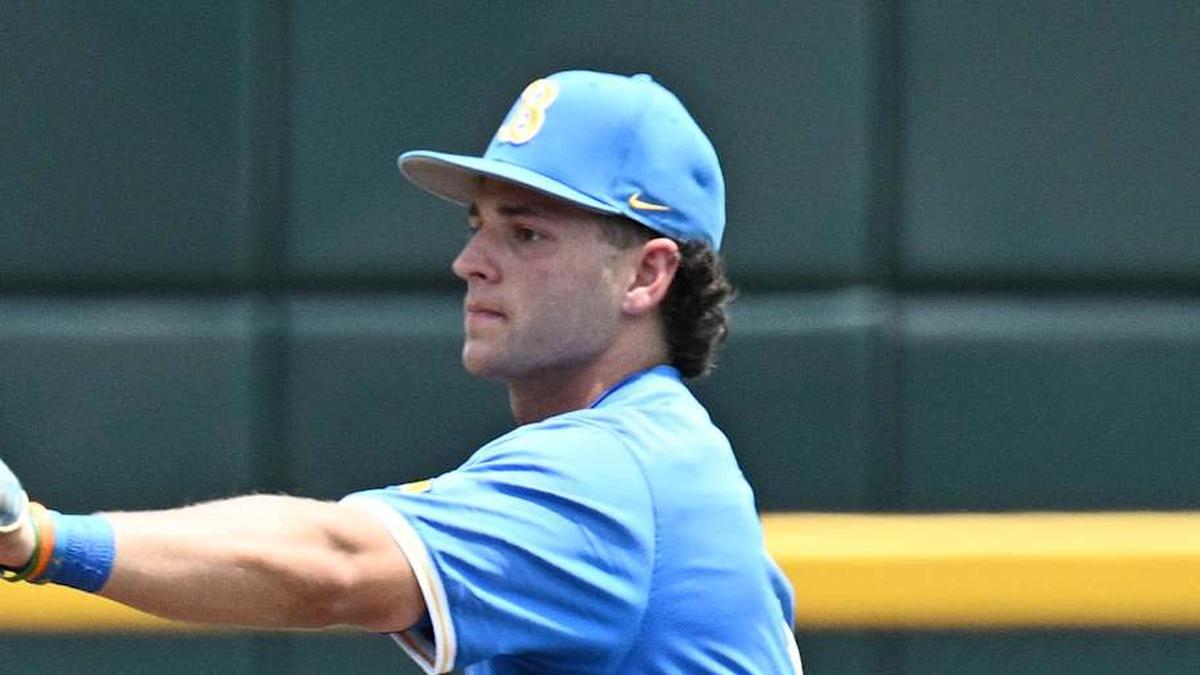  Jun 14, 2025; Omaha, Neb, USA; UCLA Bruins shortstop Roch Cholowsky (1) signals after a strike call against the Murray State Racers during the first inning at Charles Schwab Field. Mandatory Credit: Steven Branscombe-Imagn Images | Steven Branscombe-Imagn Images 