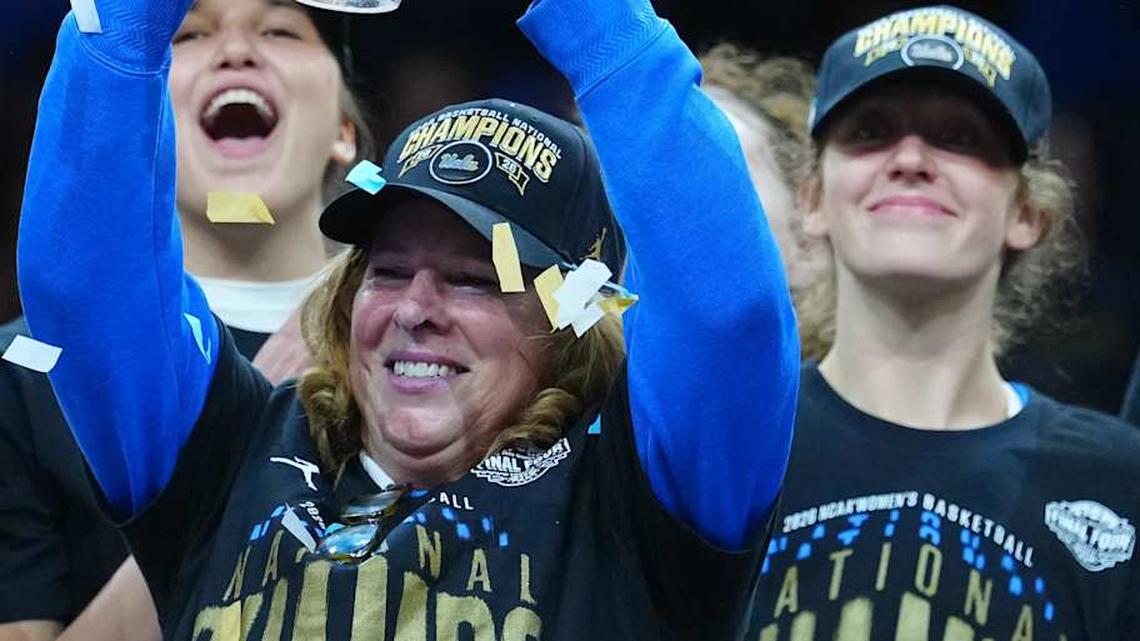  Apr 5, 2026; Phoenix, AZ, USA; UCLA Bruins head coach Cori Close celebrates on the podium after defeating the South Carolina Gamecocks during the National Championship game of the women's 2026 NCAA Tournament at Mortgage Matchup Center. Mandatory Credit: Kirby Lee-Imagn Images | Kirby Lee-Imagn Images 