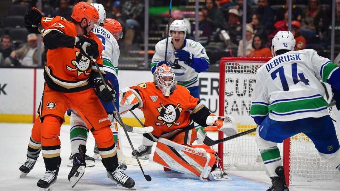 Canucks halt 10-game skid with late 3-goal rally, OT win vs. Ducks 