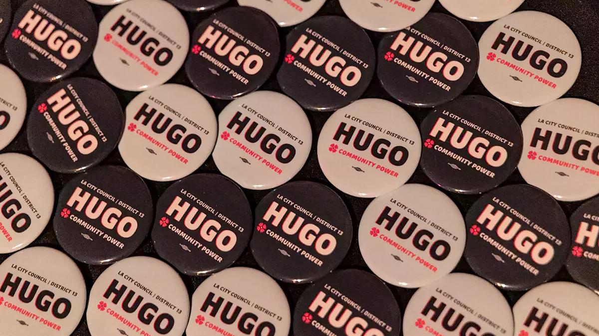A table filled with campaign buttons for Council Memer Hugo Soto-Martinez, who ran for reelection this year and is expected to win outright. (Jason Armond/Los Angeles Times/TNS)
