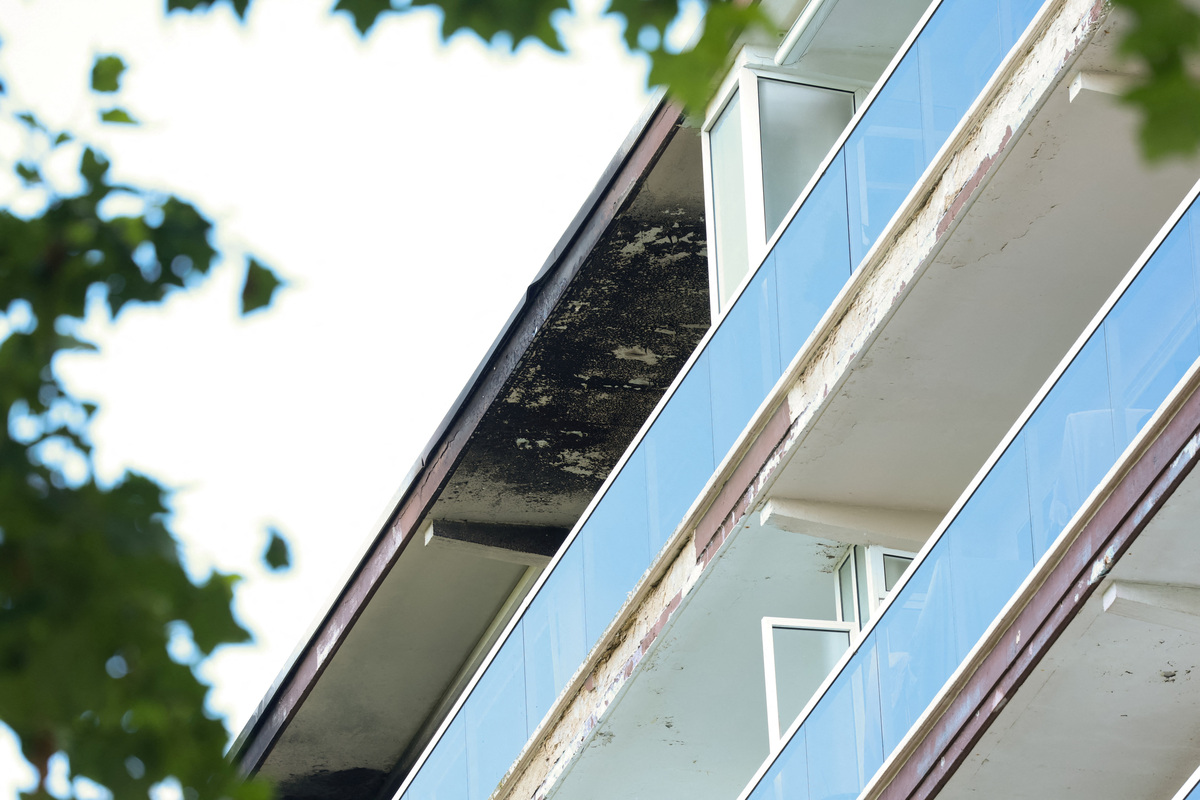 Charred ceiling of a balcony at the site of a fire in a housing building in Antwerp, Belgium, July 1, 2026. REUTERS/Yves Herman