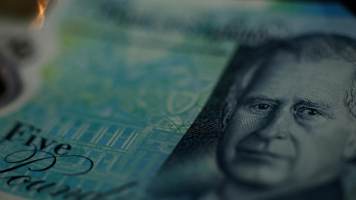 Who are the 'bond vigilantes' exacting a price from Britain's government? 