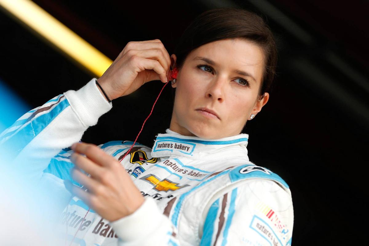  RICHMOND, VA - APRIL 22: Danica Patrick, driver of the #10 Nature's Bakery Chevrolet, stands in the garage area during practice for the NASCAR Sprint Cup Series TOYOTA OWNERS 400 at Richmond International Raceway on April 22, 2016 in Richmond, Virginia. (Photo by Brian Lawdermilk/Getty Images) 