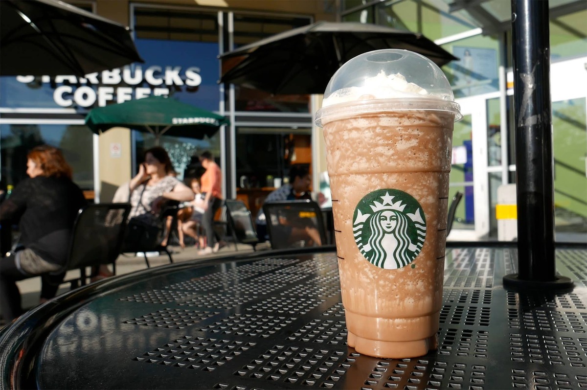   Starbucks coffee shop introduces new Orange Cream drinks tied to summer nostalgia. Getty Images