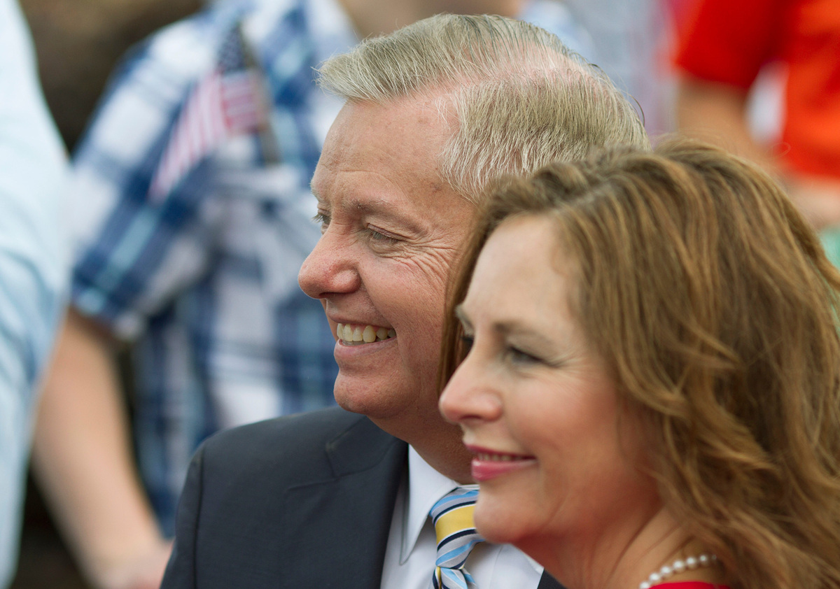 Sen. Lindsey Graham stands with his sister, Darline Graham Nordone, after formally announcing his 2016 Republican presidential campaign in Central, South Carolina on June 1, 2015.