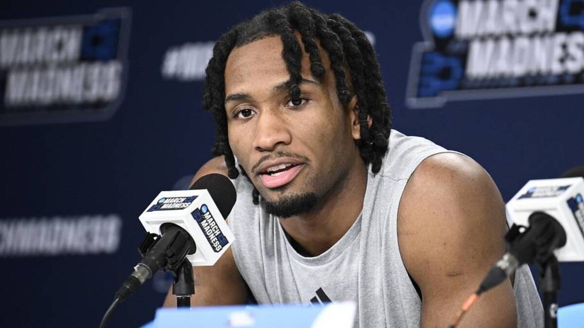  Mar 19, 2026; San Diego, CA, USA; Kansas Jayhawks guard Darryn Peterson (22) speaks at a news conference ahead of the first round of the men's 2026 NCAA Tournament at Viejas Arena. | Denis Poroy-Imagn Images 