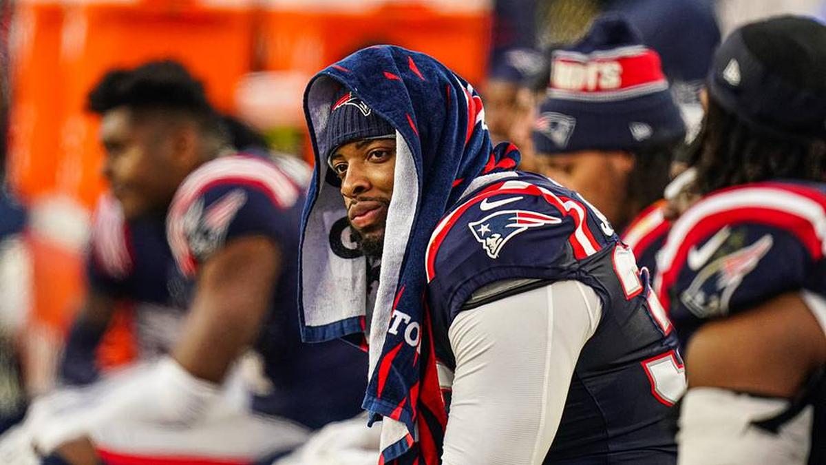  Dec 28, 2024; Foxborough, Massachusetts, USA; New England Patriots linebacker Anfernee Jennings (33) on the sideline as they take on the Los Angeles Chargers in the second half at Gillette Stadium. Mandatory Credit: David Butler II-Imagn Images | David Butler II-Imagn Images 