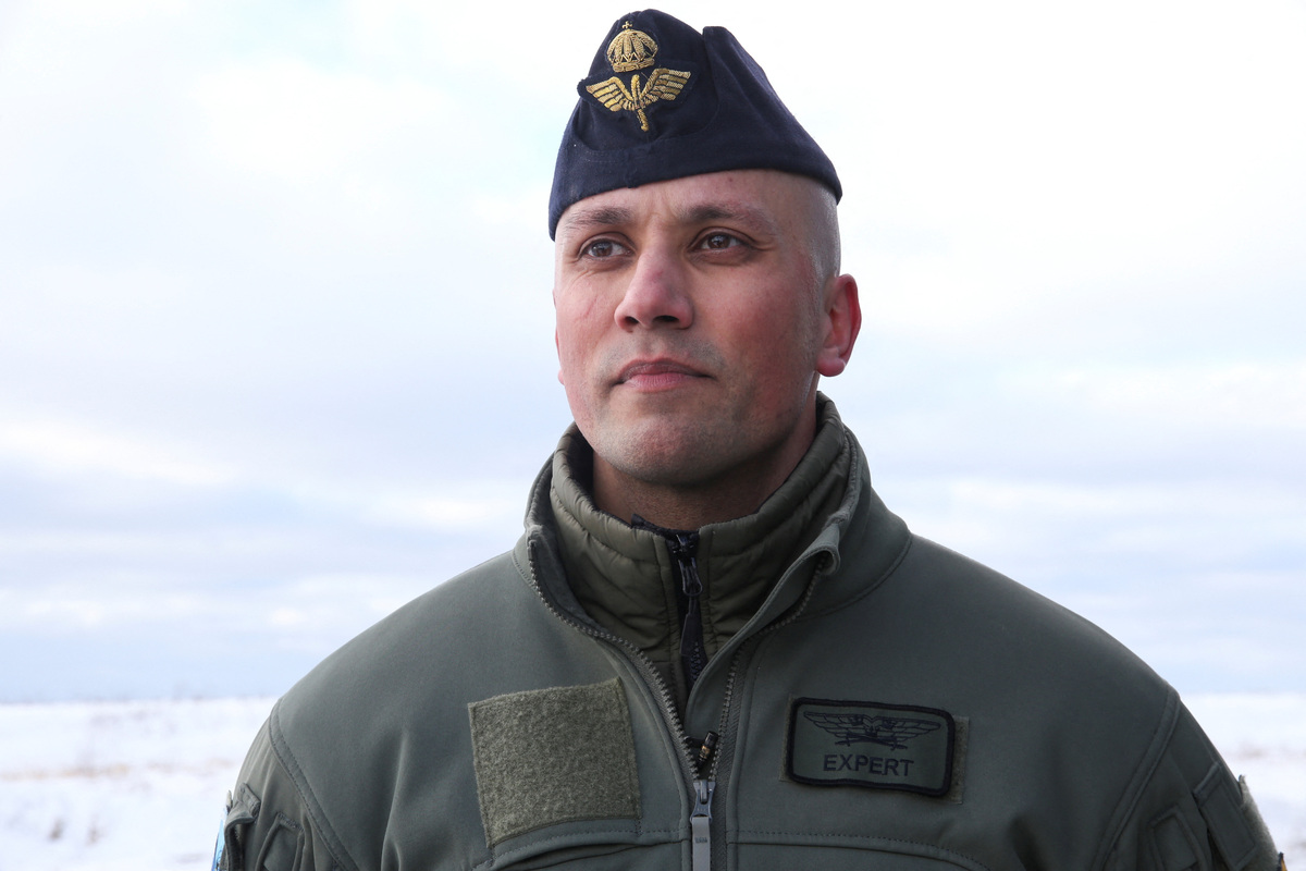 Squadron commander and pilot in the Swedish Air Force, Lieutenant Colonel Robin Arvidsson, talks to a journalist in Keflavik, Iceland, March 2, 2026. REUTERS/Tom Little