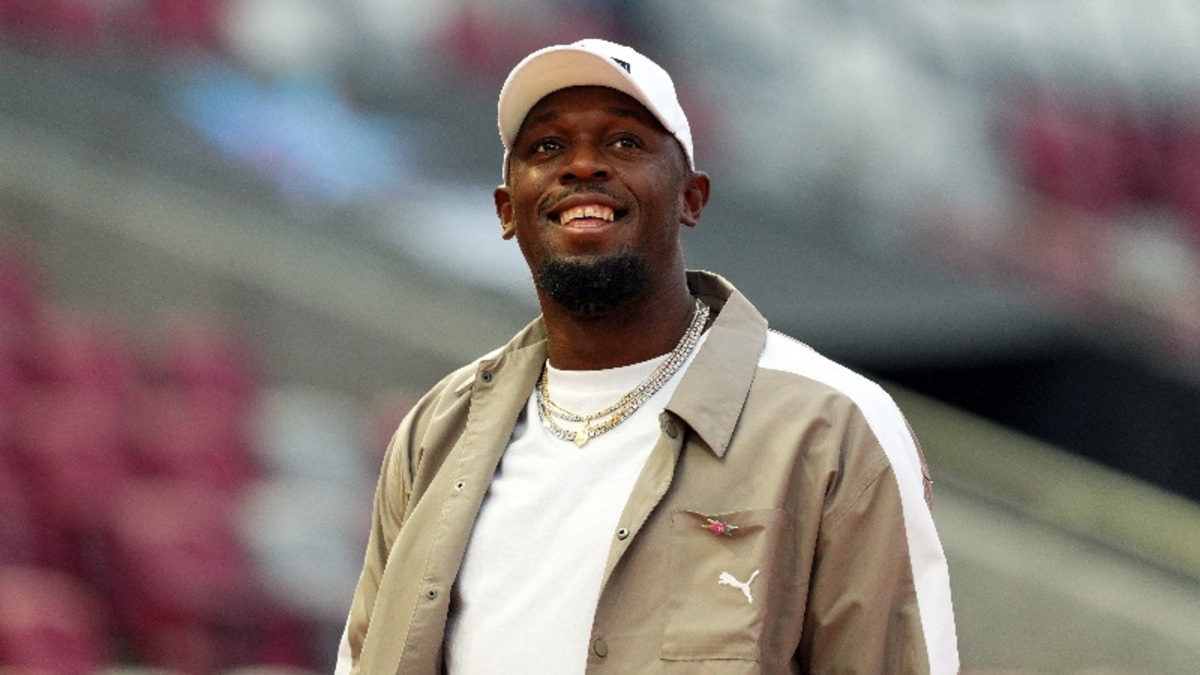 Athletics-Bolt unfazed by robot's record run, eyes Manchester derby instead