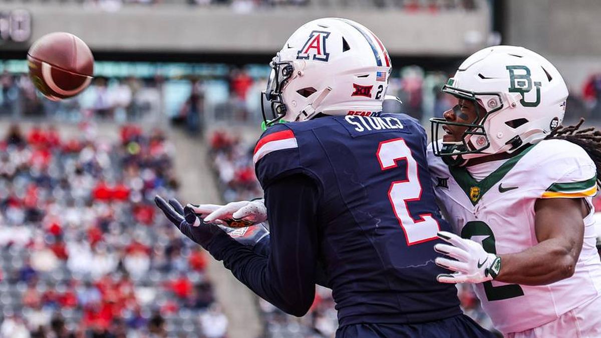  Nov 22, 2025; Tucson, Arizona, USA; Arizona Wildcats defensive back Treydan Stukes (2) intercepts the ball in the end zone during the fourth quarter of the game against the Baylor Bears at Casino Del Sol Stadium. Mandatory Credit: Aryanna Frank-Imagn Images | Aryanna Frank-Imagn Images 
