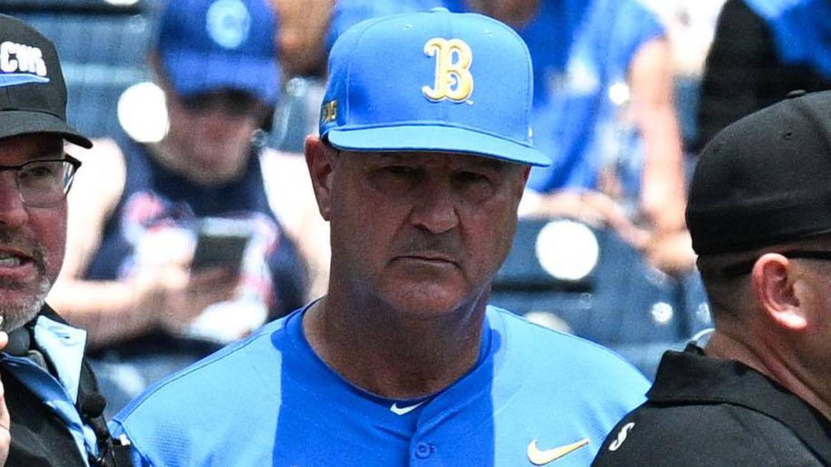  Jun 14, 2025; Omaha, Neb, USA; Murray State Racers head coach Dan Skirka and UCLA Bruins head coach John Savage meet with umpires before the game at Charles Schwab Field. Mandatory Credit: Steven Branscombe-Imagn Images | Steven Branscombe-Imagn Images 